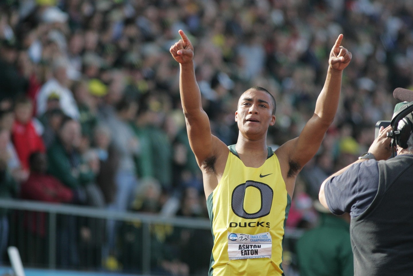 Ashton Eaton points his fingers in the air