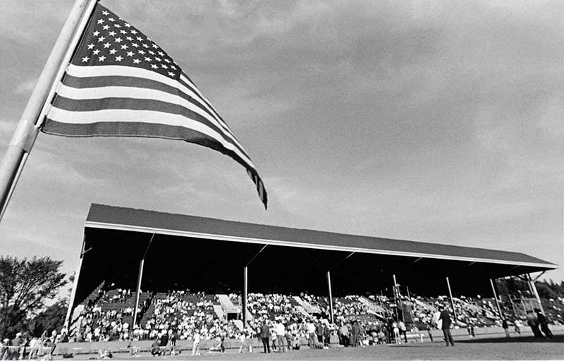 The east grandstand at Hayward Field taken during a late 1960s meet, with an American flag in the foreground at left. The east grandstand at Hayward Field taken during a late 1960s meet, with an American flag in the foreground at left.