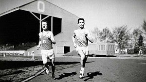 distance runners Bill Dellinger (left) and Jim Bailey running at Hayward Field during a 1955 practice distance runners Bill Dellinger (left) and Jim Bailey running at Hayward Field during a 1955 practice