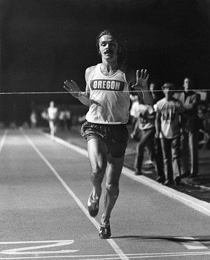 Prefontaine crossing a race finish line.