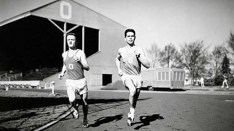 distance runners Bill Dellinger (left) and Jim Bailey running at Hayward Field during a 1955 practice distance runners Bill Dellinger (left) and Jim Bailey running at Hayward Field during a 1955 practice