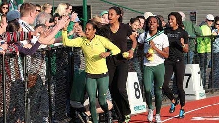 University of Oregon women's 4 x 100 meter relay team taking their victory lap at the Oregon Twilight on May 5, 2012 at Hayward Field University of Oregon women's 4 x 100 meter relay team taking their victory lap at the Oregon Twilight on May 5, 2012 at Hayward Field