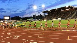 Athletes running around the track at Hayward Field during the IAAF World Junior Championships in 2014 Athletes running around the track at Hayward Field during the IAAF World Junior Championships in 2014